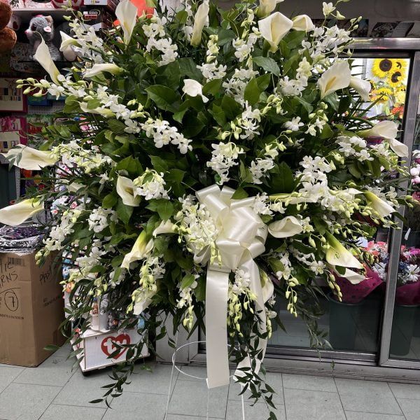 All white standing basket, Calla lily’s and dendrobium orchid